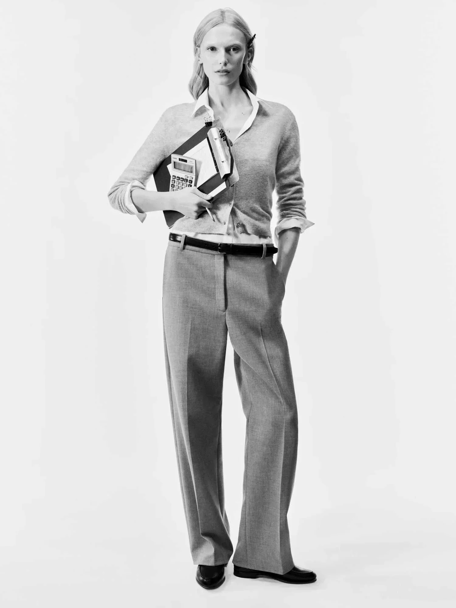 Alex Consani in cashmere knitwear and tailoring