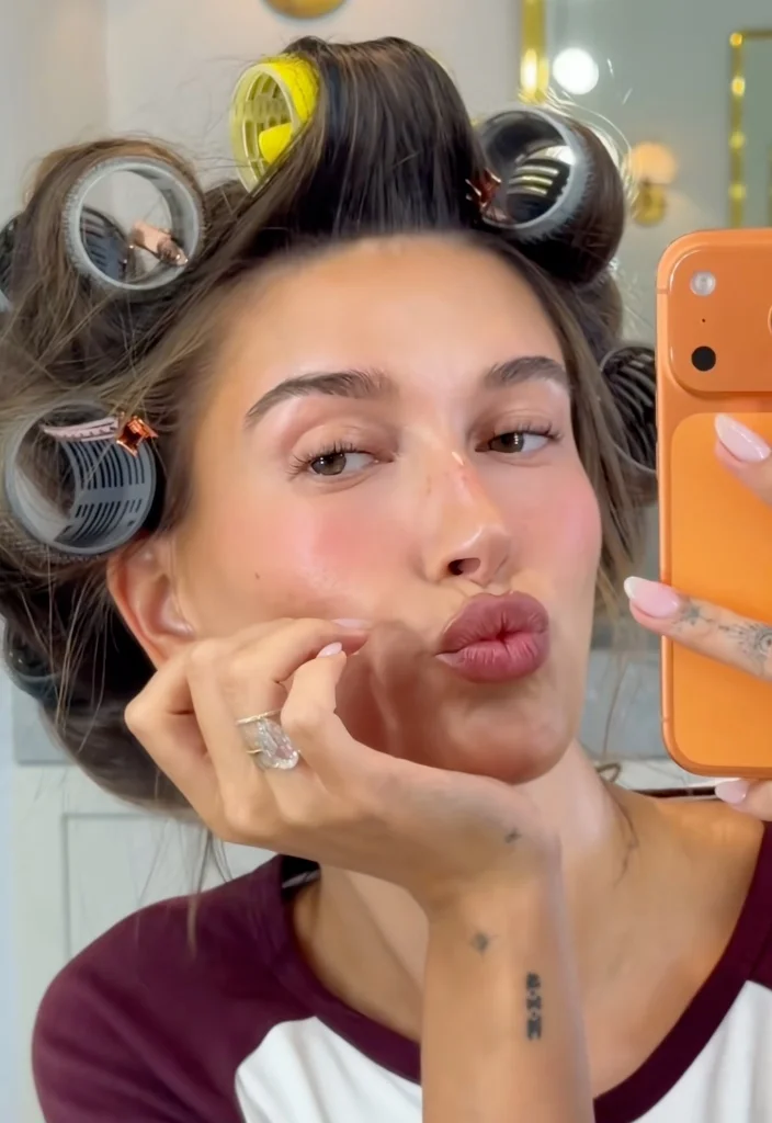 Hailey Bieber in Brandy Melville Bella Top and Drybar Hair Rollers