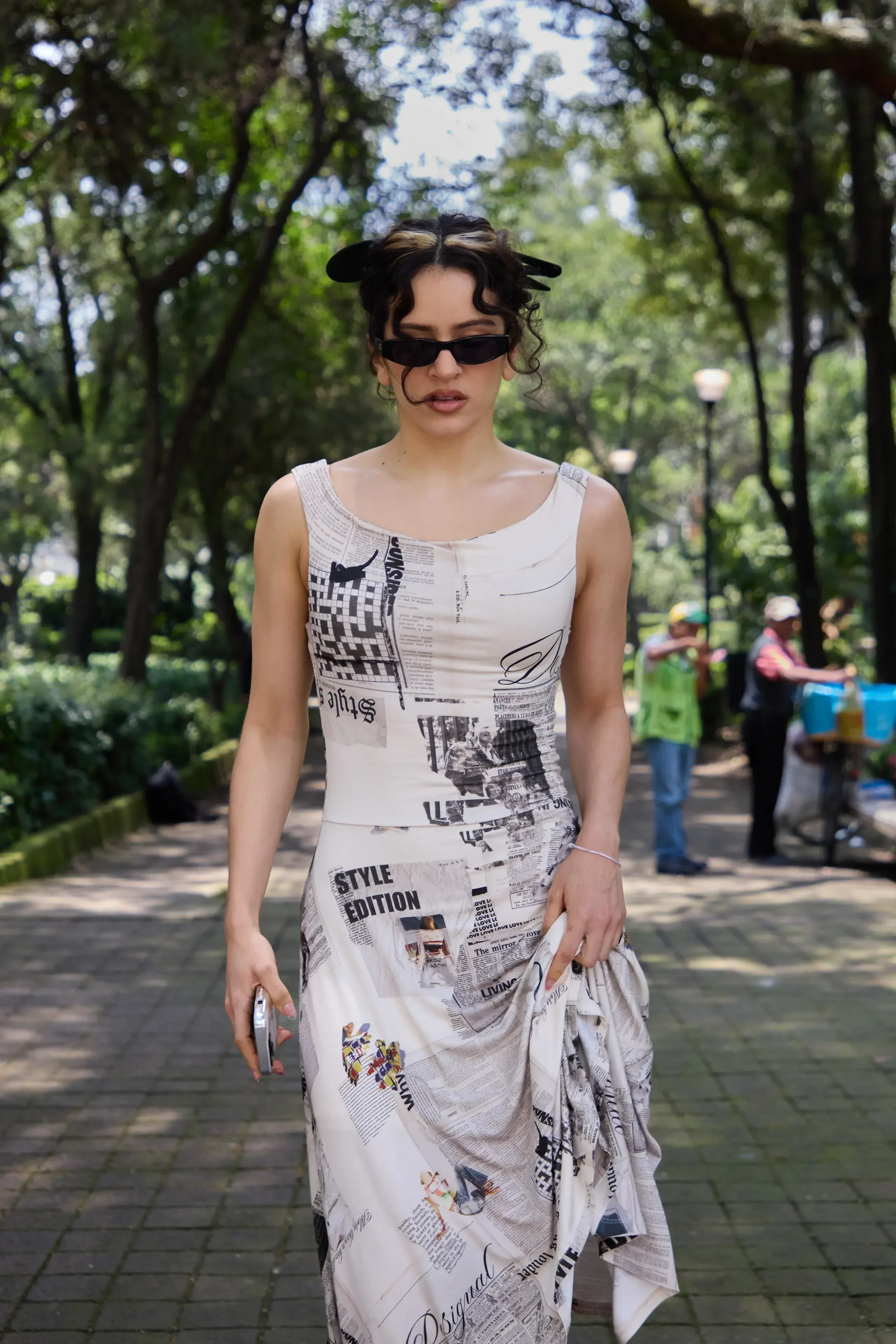 Rosalía Brings Carrie Bradshaw’s Iconic Newspaper Dress Back—For Just $160