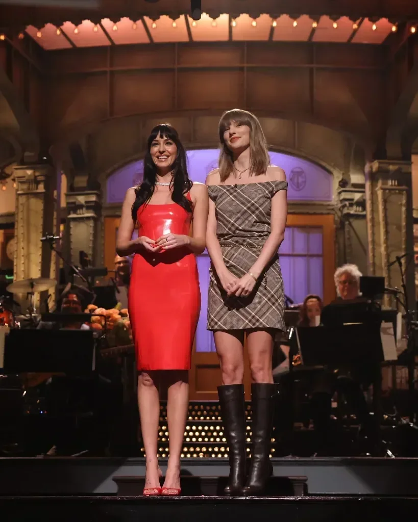 Taylor Swift in Plaid Simkhai and Burberry Boots for Surprise Saturday Night Live Appearance - Fashion look worn by Taylor Swift