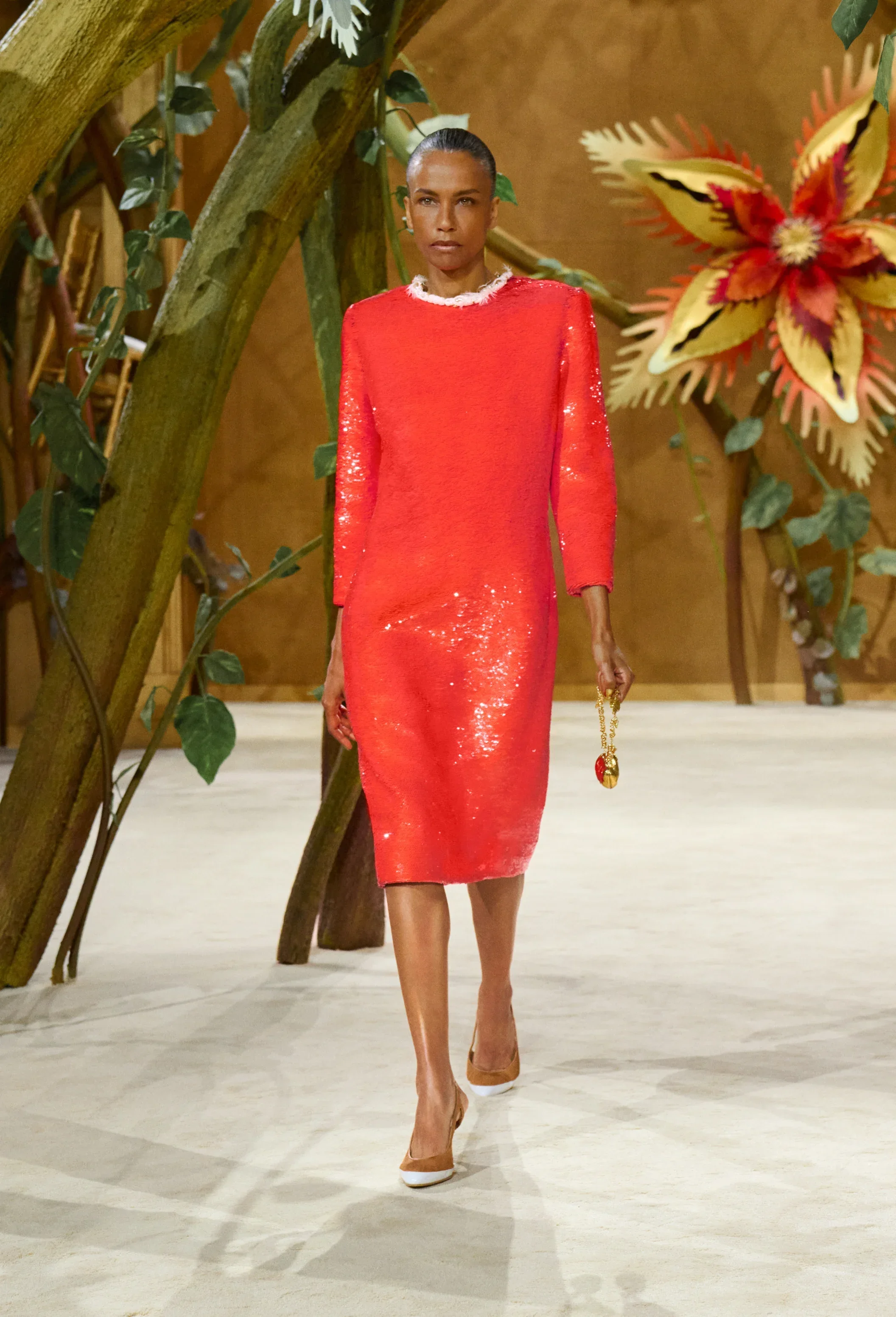 Stephanie in red sequined Chanel couture dress