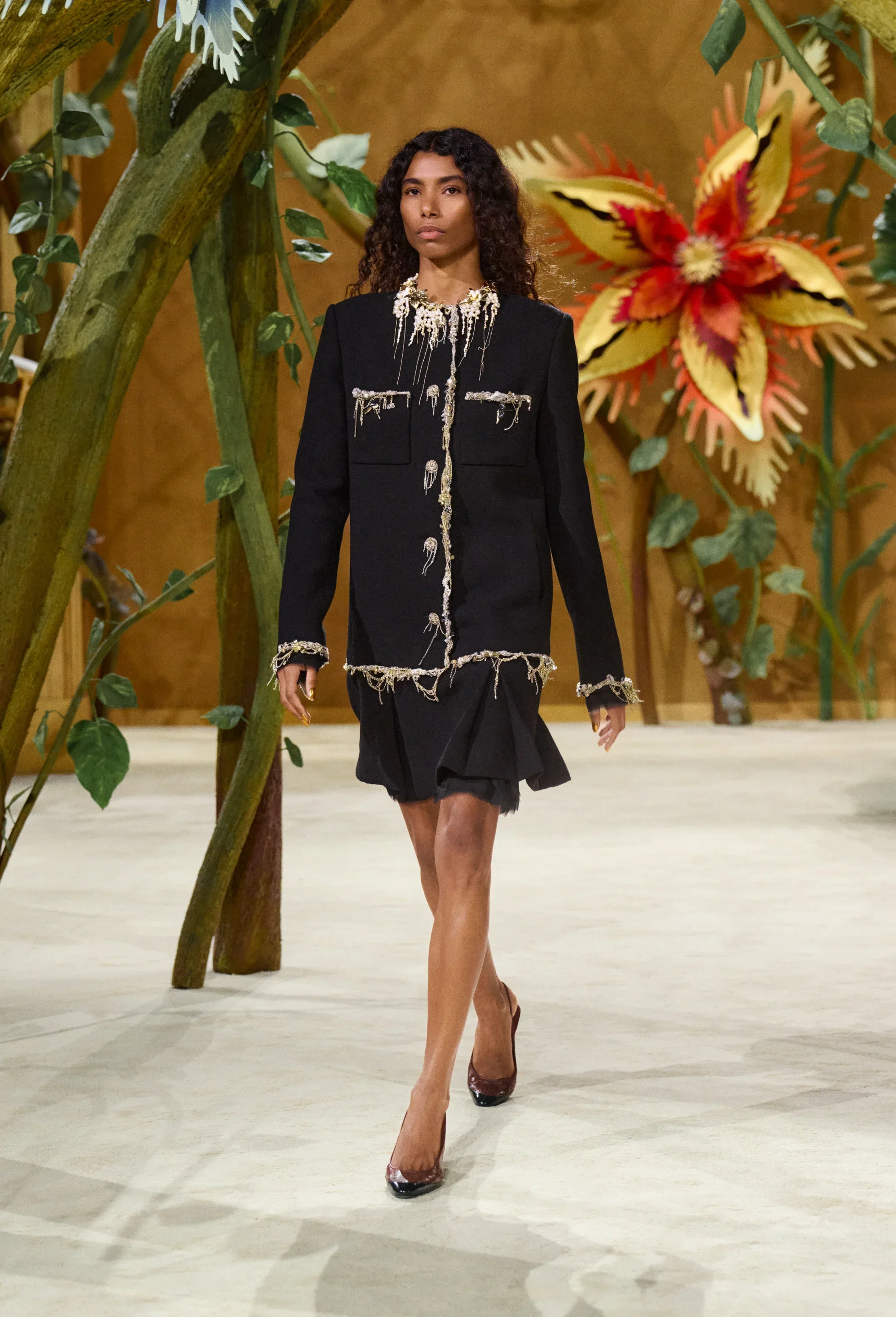 Chanel tailored black jacket with frayed tweed edges
