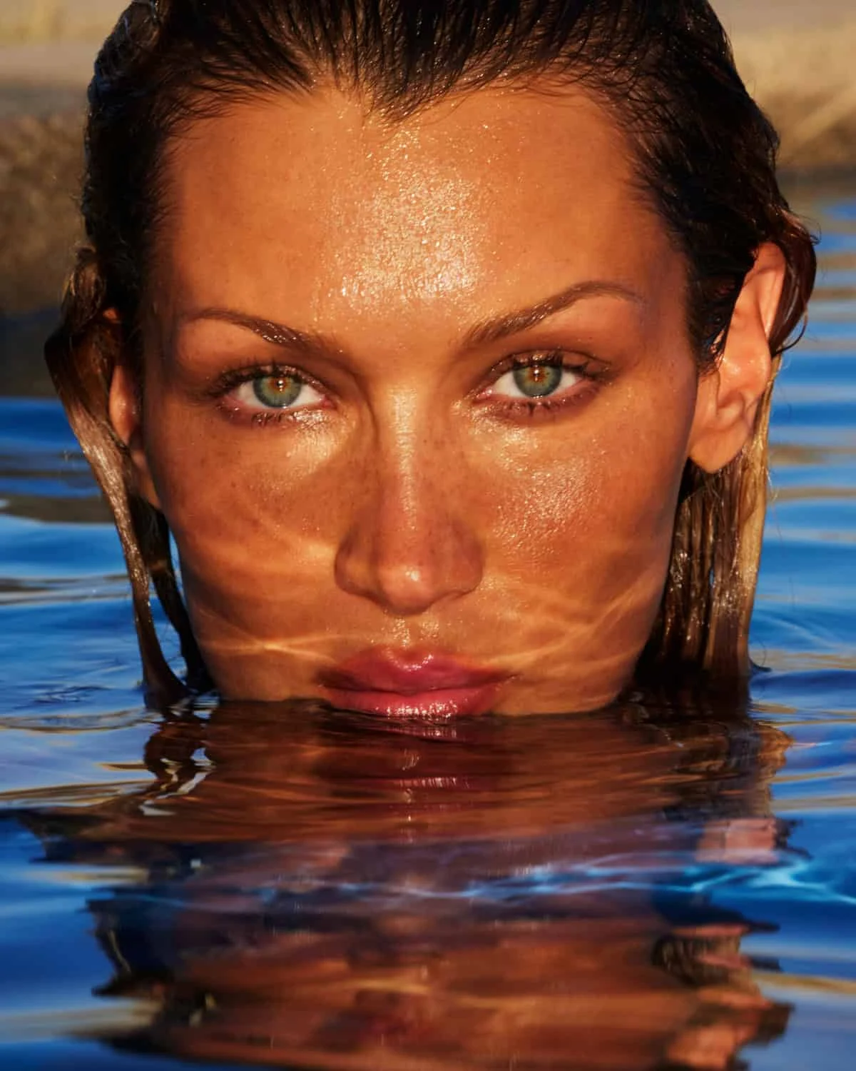 Bella Hadid submerged in pool water by Mert & Marcus