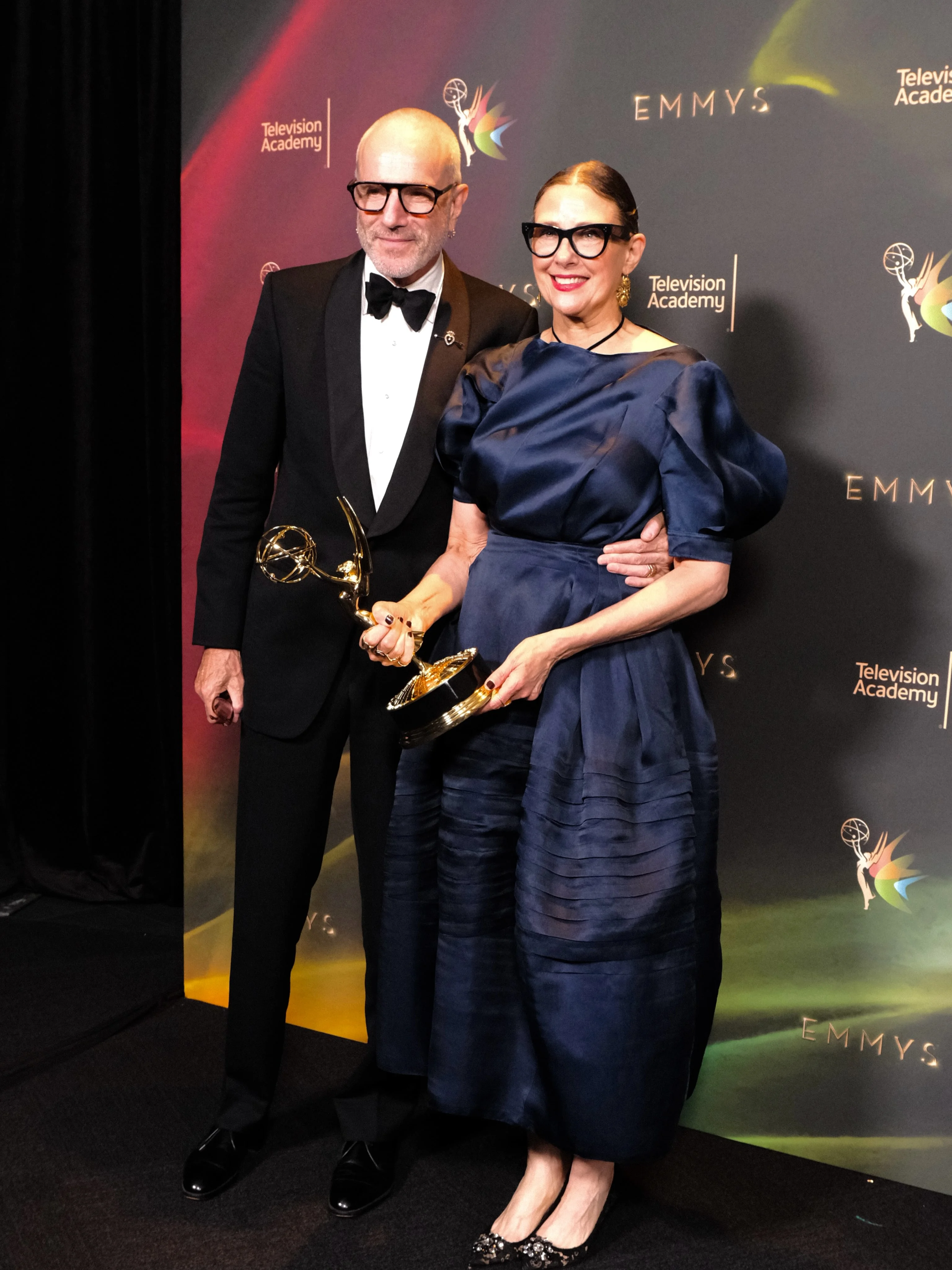 Directing and writing partners in designer eyewear backstage