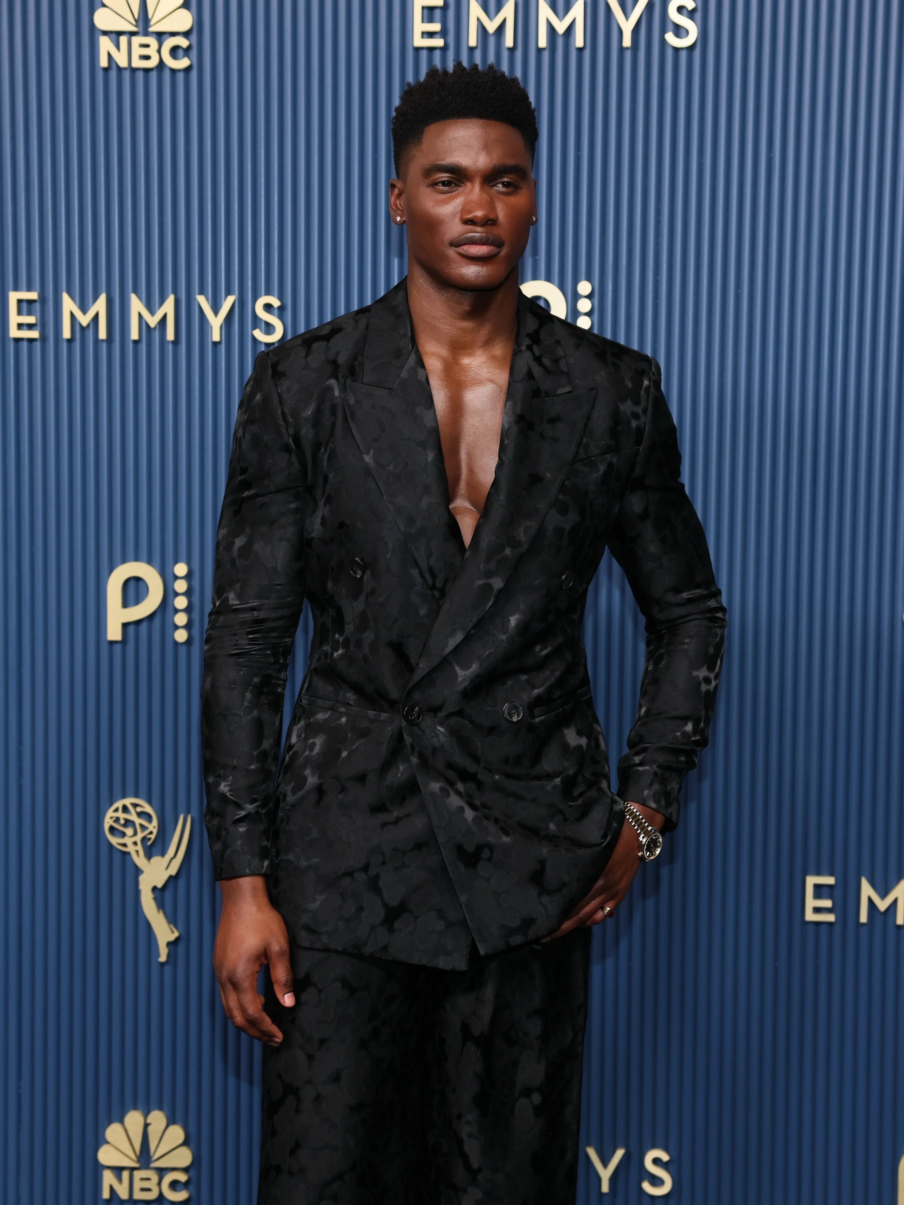 Damson Idris wearing shirtless double-breasted jacquard tuxedo jacket