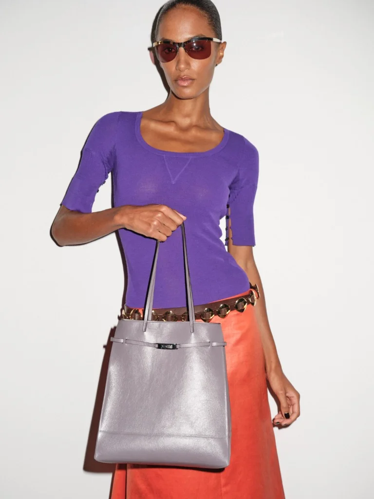 Tory Burch Spring 2027 wisteria purple top and persimmon skirt