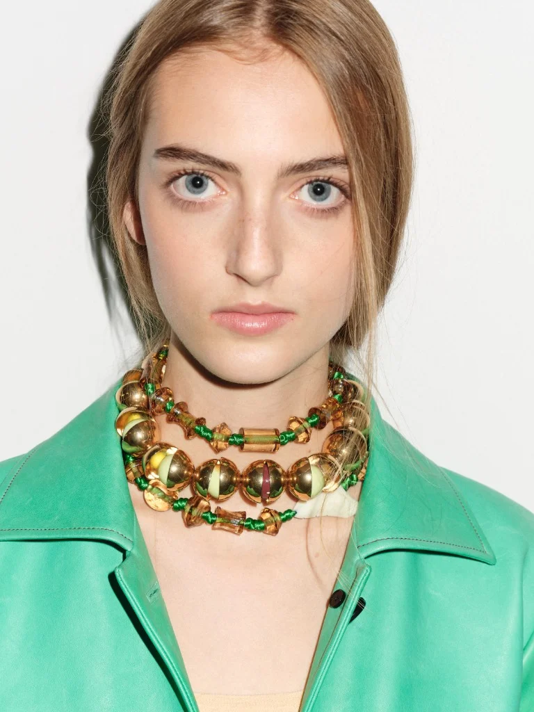 Tory Burch Spring 2027 brass sphere and stacked resin beaded necklace detail
